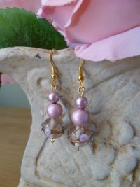 Elegant soft pink earrings made with handpainted glass beads.
Arrives boxed and gift wrapped with French and Floral ribbon. Price: &pound;19.04